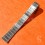 Cartier Santos Rare pièce fourniture horlogère Bracelet Neuf Santos or acier 18mm galbé Ref MX000P1F