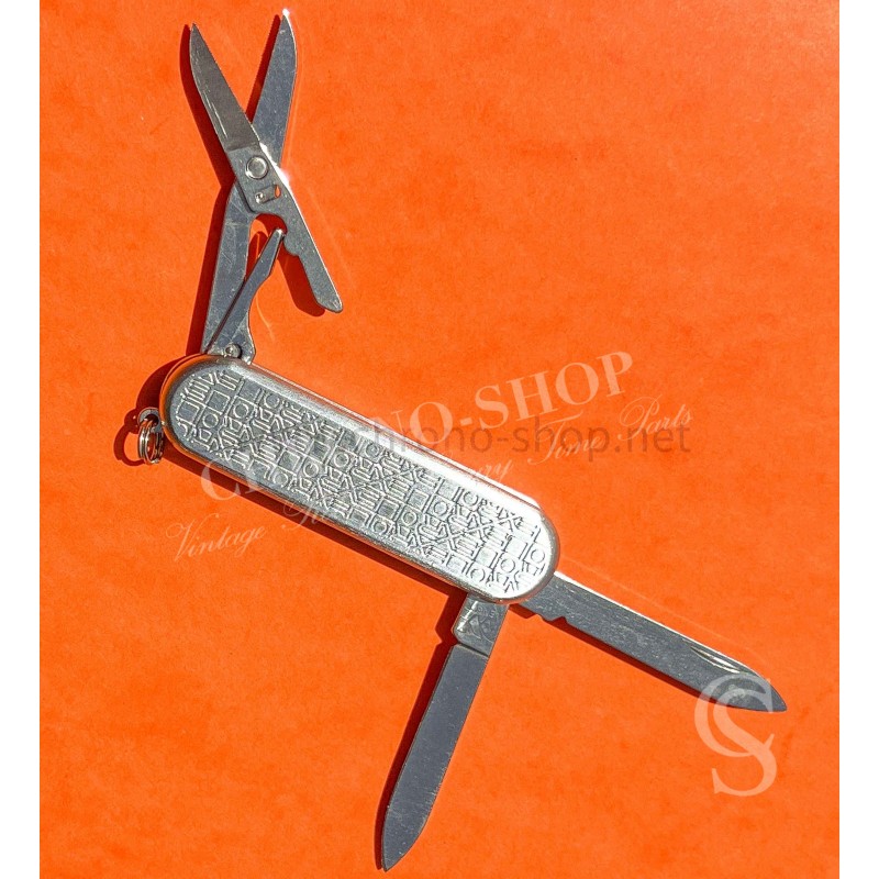 Rolex authentique accessoire couteau de poche suisse en acier signé Wenger Delémont Switzerland Stainless