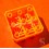Bloc support plastique orange pour réparation bracelet montre horlogerie