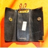 Yves Saint Laurent Paris Authentique Porte-clés en cuir couleur noir vintage des années 80