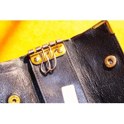 Yves Saint Laurent Paris Authentique Porte-clés en cuir couleur noir vintage des années 80